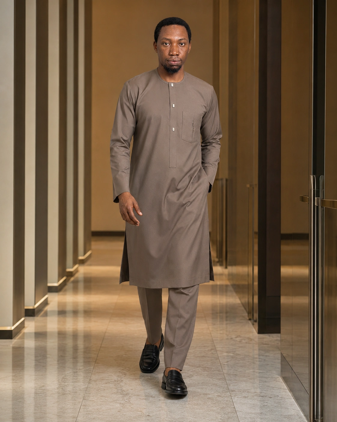 Man in a taupe senator kaftan by Muahib Collections